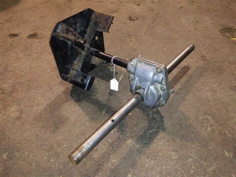 Fan Diameter, 23"; Number of Blades, 4; Auger diameter 15"; Adjustable and Replaceable Skid Shoes . . Snowblower auger gearbox
